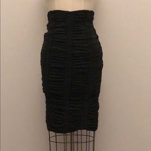 Tight fitted pencil skirt. Made in Italy
